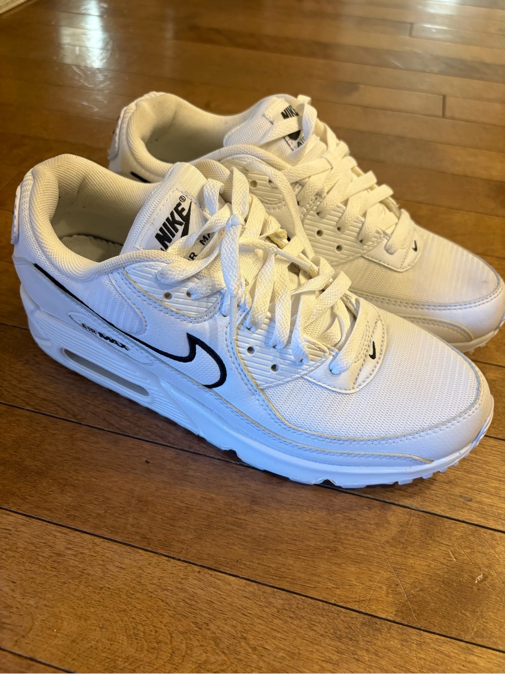Nike White Women’s Sneakers with Black Swoosh